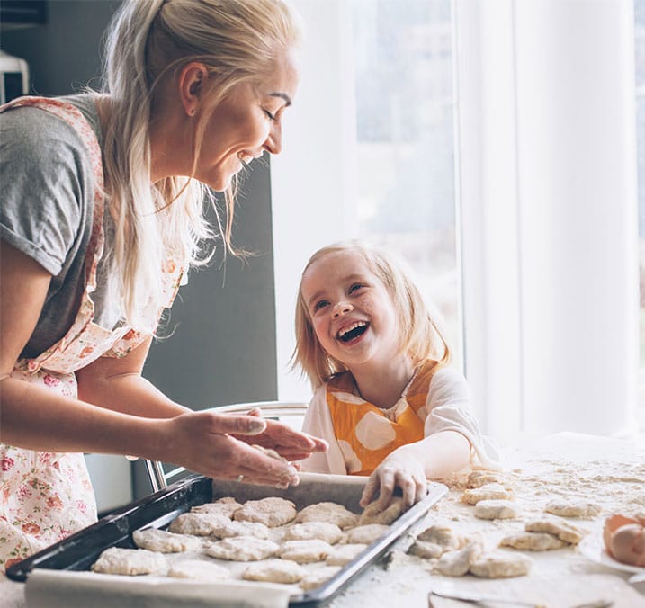 Mother and Daughter Enjoy baking cookie
